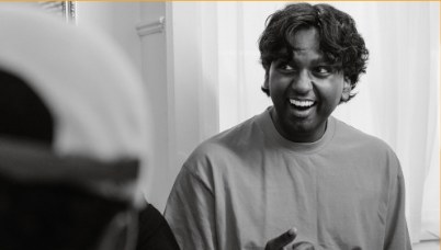 Simon, smiling during an Alpha small group